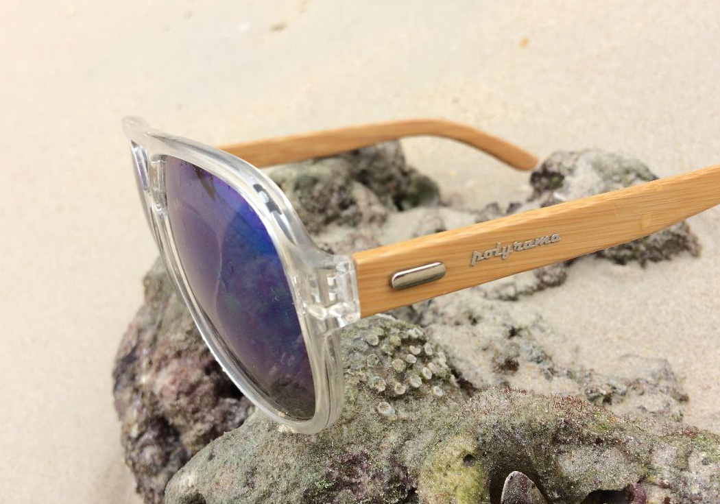 wooden aviator sunglasses clear on the beach